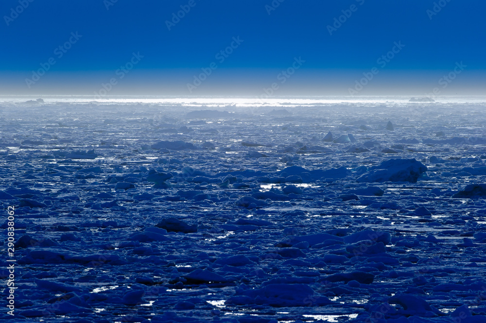 Fototapeta premium Sunset over an ice pack in the Arctic Circle, Nordaustlandet, Svalbard, Norway