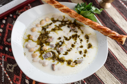 Turkish traditional hot yoghurt soup, Yuvalama Corbasi. photo