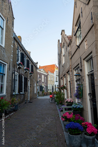 Street view in small Dutch town Goedereede on sunset, Zeeland, Netherlands © barmalini
