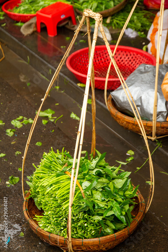 Produce for sale in traditional basket, Hoi An, Vietnam