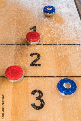 Shuffleboard top with discs