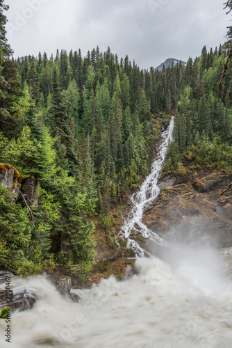 A photographer at Morkill Falls, BC, Canada photo