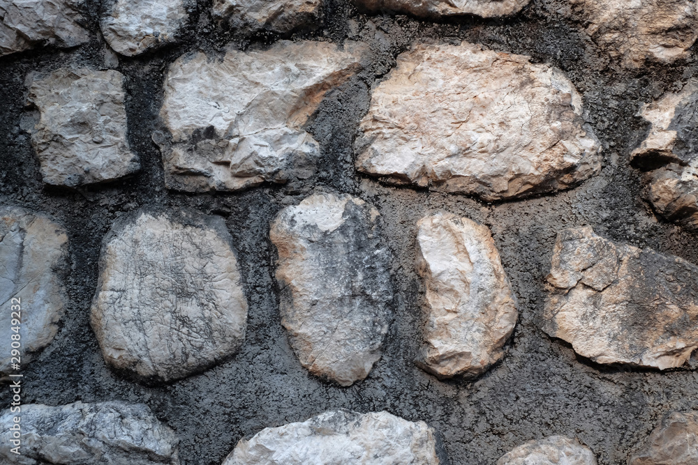 Fototapeta premium Old stone wall as background, closeup view