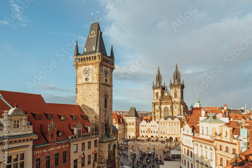 Prague, Czech Republic - March, 18th, 2019: View of the Old Town Square in Prague from the terrace of a house, with tourists and locals, walking and shopping.