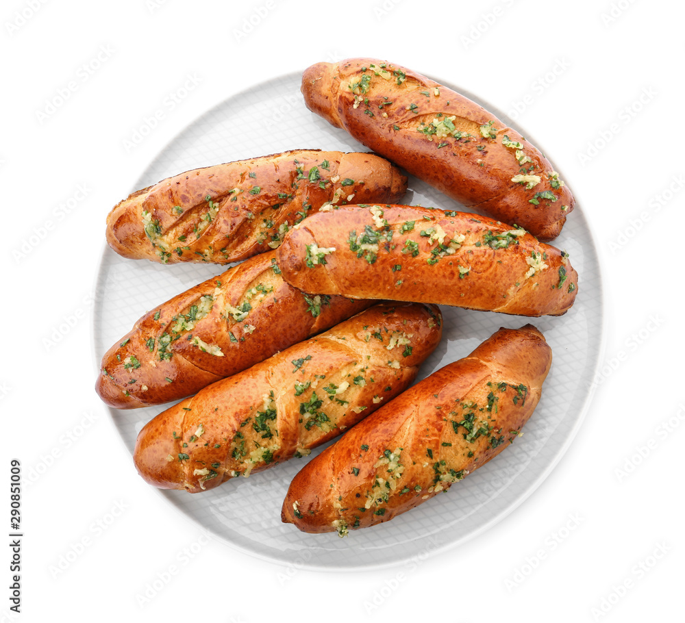 Plate of bread loaves with garlic and herbs on white background, top view Plate of bread loaves with garlic and herbs on white background, top view