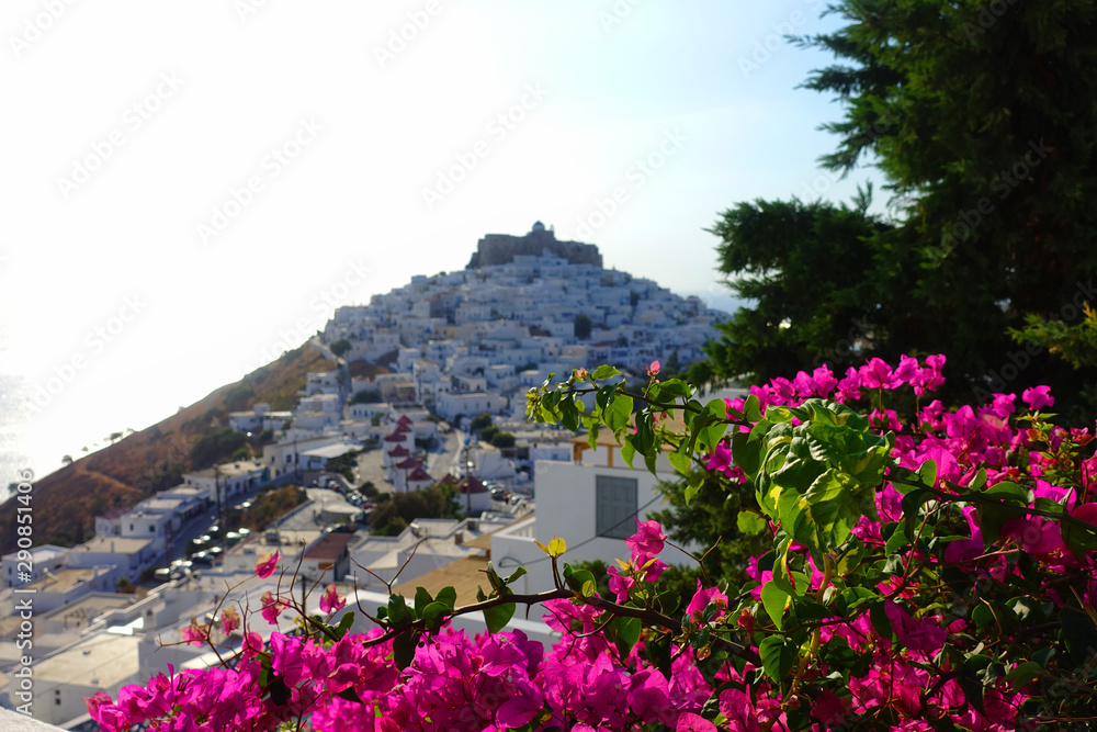 Picturesque castle of Astypalaia island as seen through beautiful bougainvillea in blossom, Dodecanese, Greece