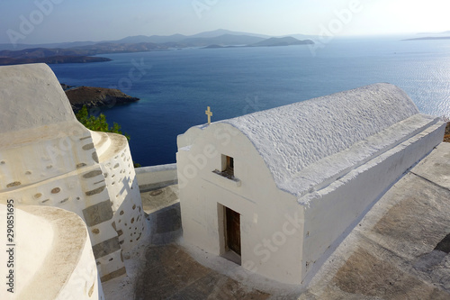 Picturesque small chapels below iconic castle of Astypalaia island with views to the Aegean deep blue sea