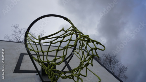 basketball hoop on a background of blue sky © Moses