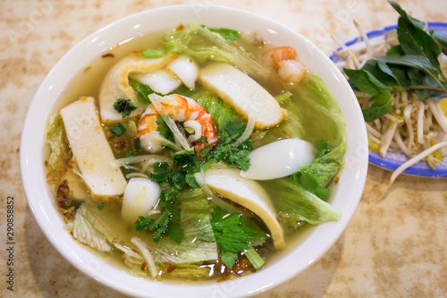 Vietnamese seafood noodle soup in the bowl