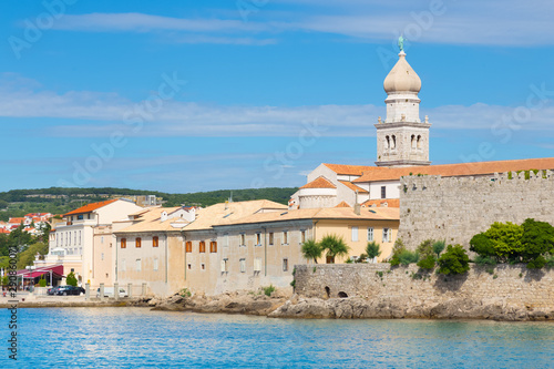 Famous touristic Krk town on Krk island, Croatia, Europe. Krk is a Croatian island in the northern Adriatic Sea, located near Rijeka in the Bay of Kvarner and part of Primorje Gorski Kotar county. photo