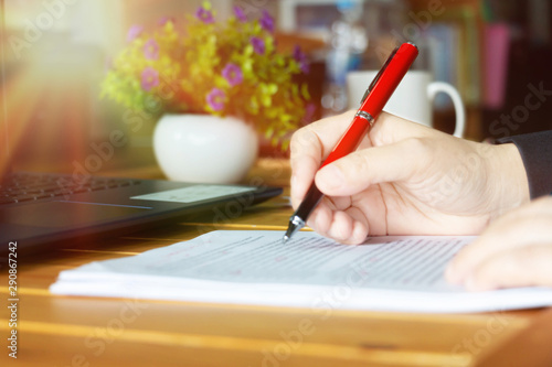 Obraz na plátně editing text on desk in office