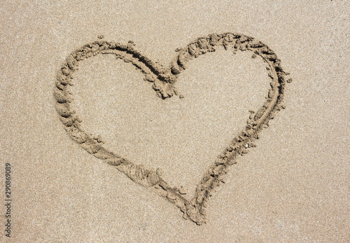 Heart on sand beach