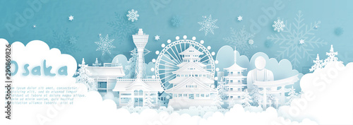 Panorama postcard and travel poster of world famous landmarks of Osaka, Japan in winter season with falling snow in paper cut style vector illustration