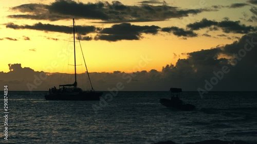 Catamaran Boat Hawaii Sunset Small Boat loads to big boat Hawaii Big Island photo