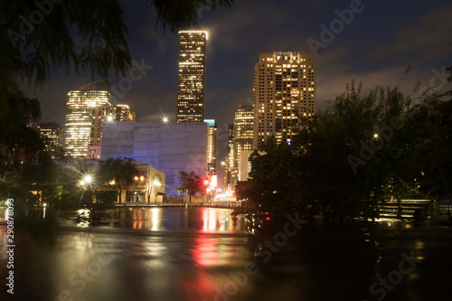 TROPICAL DEPRESSION IMELDA. Houston flood. Night city reflected in high water photo