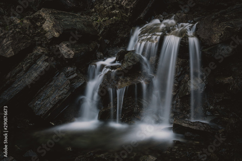 Small waterfall  streaming on the rocks © Pekka Peltola