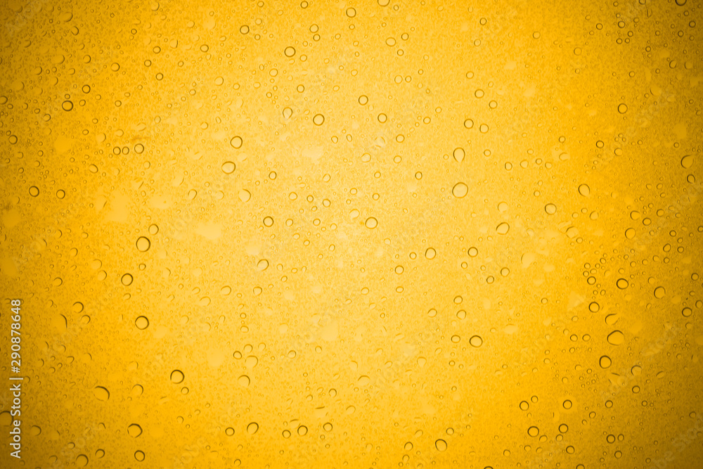 Water drops on yellow glass, Rain droplets on glass background. Water drops on yellow glass, Rain droplets on glass background.
