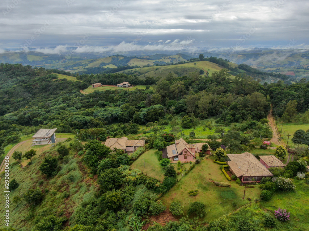 Aerial view of luxury villa in tropical valley. Monte Alegre Do Sul. Brazil. Countryside destination for local tourist.