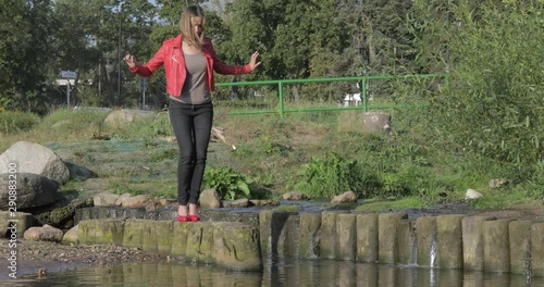 Damsel in distress in reed high heels as a woman in inappropriate footwear gets herself in a predicament and begs for help.