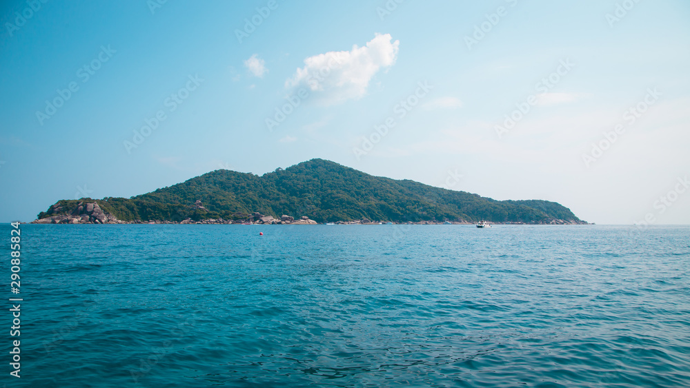 Similan Islands, Andaman Sea, Thailand, National park, beautiful blue sea. White boats with tourists.