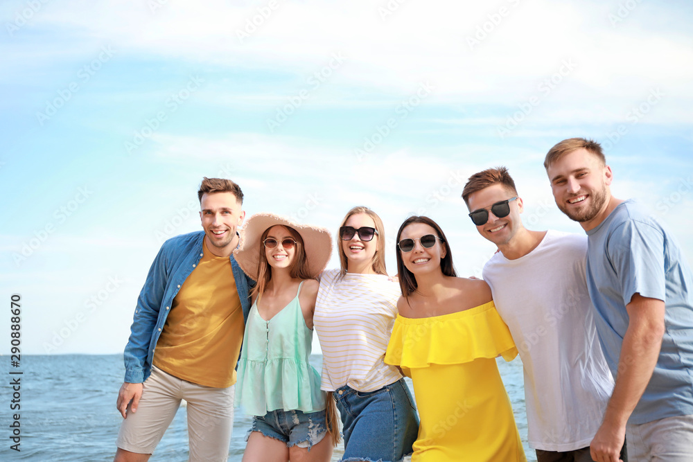 Happy friends on sea beach at resort Happy friends on sea beach at resort