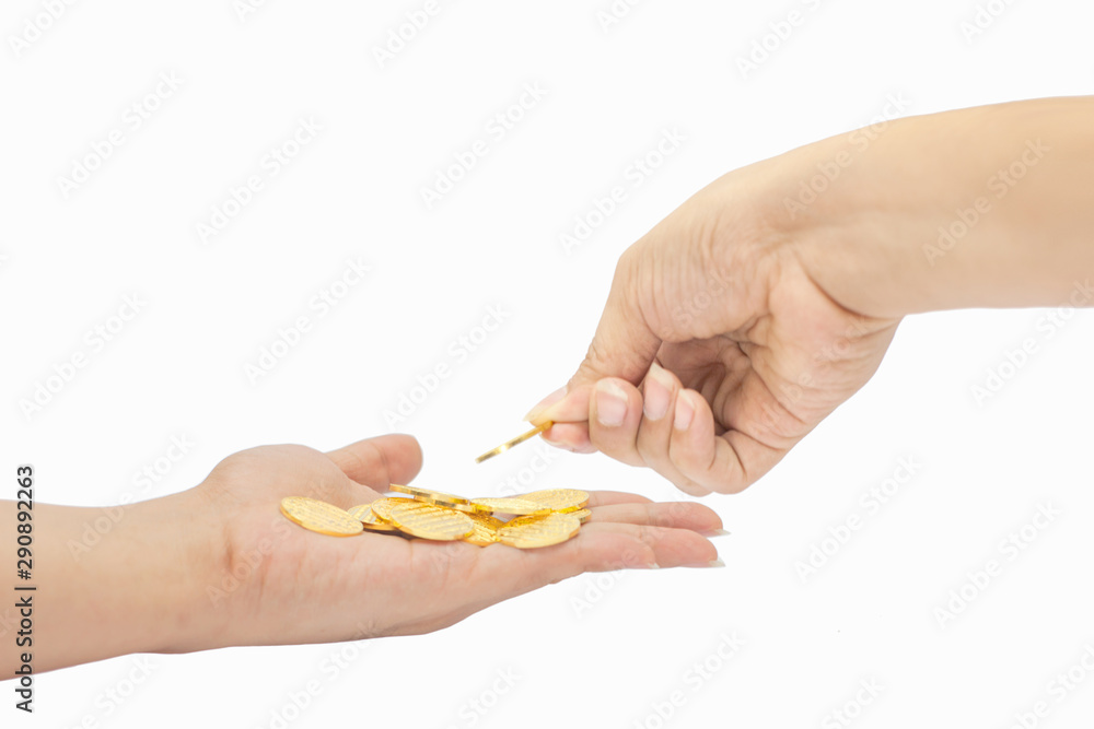 Fototapeta premium Gold coins with hand isolated on white, investment concept, white background, pure gold, Saving, growing business. Investment money concept, Hand put a coin on the other hand, holding gold.