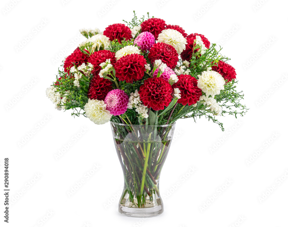 Bouquet of autumn flowers in a glass vase isolated on white