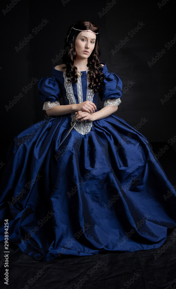 Renaissance woman in blue silk dress Renaissance woman in blue silk dress