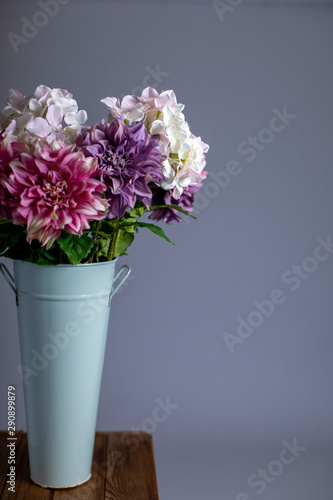 Wallpaper Mural Silk flowers in a tall metal vase Torontodigital.ca