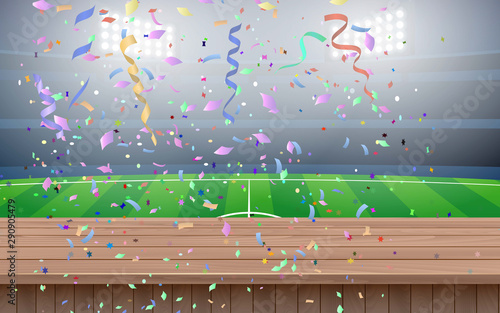 landscape of confetti on the wooden table in the football field