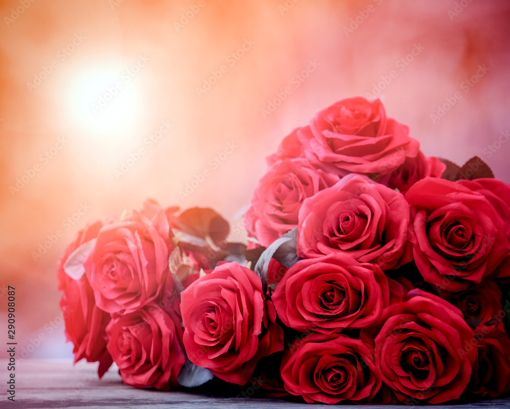 close up beautiful red roses bouguet with glowing light background for valentine day and love theme close up beautiful red roses bouguet with glowing light background for valentine day and love theme