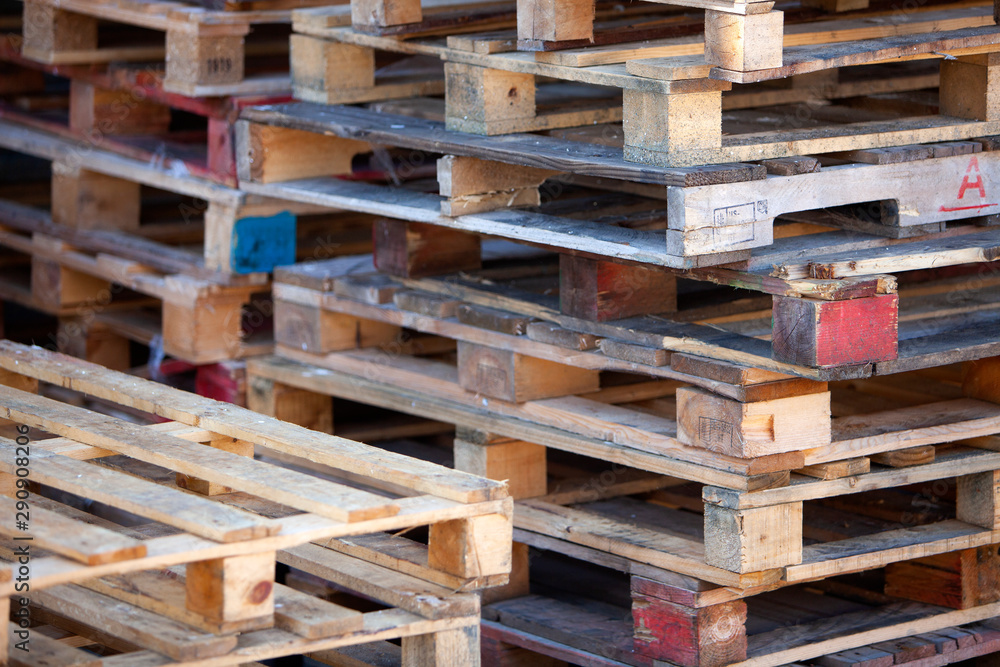 closeup of pile of empty wooden pallets closeup of pile of empty wooden pallets