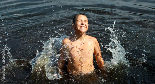 Boy having fun in the water.