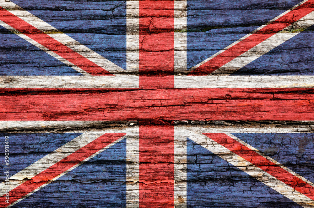 Fototapeta premium Flag of Britain on an old wooden surface.