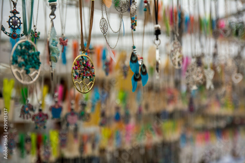 necklaces displayed at a market stall