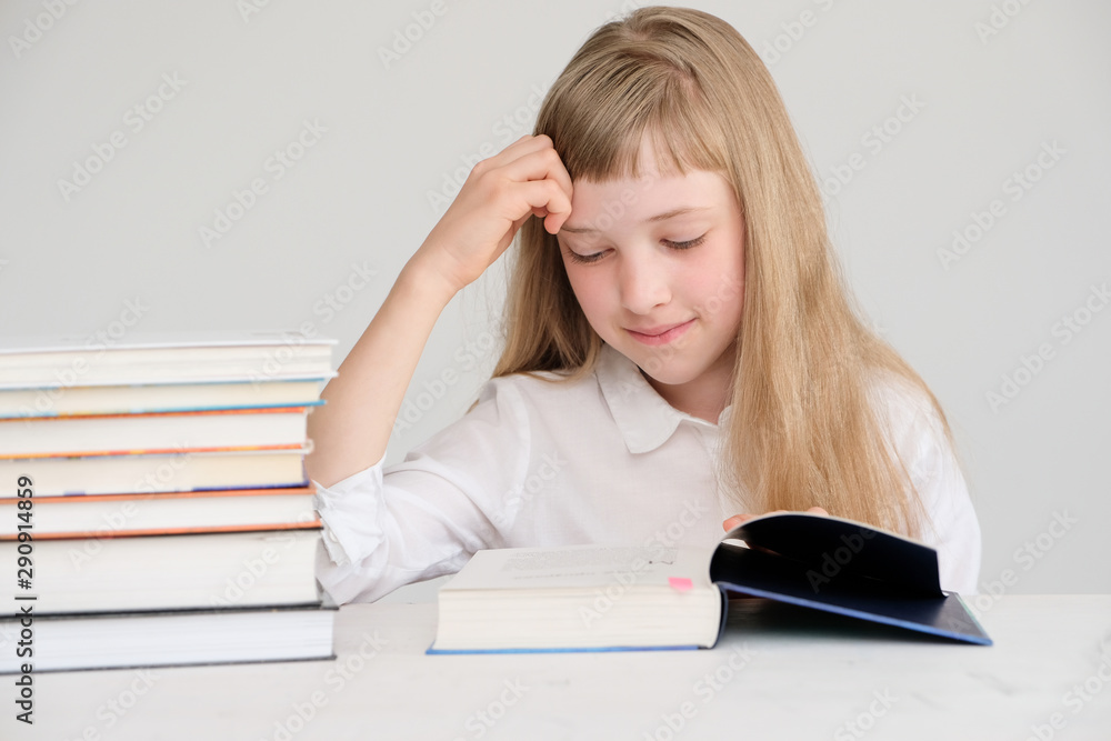 An excellent student looks for information in books. An excellent student looks for information in books.