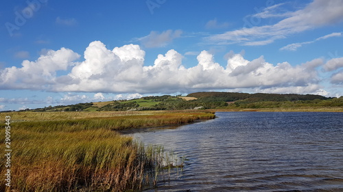 landscape with lake and blue sky