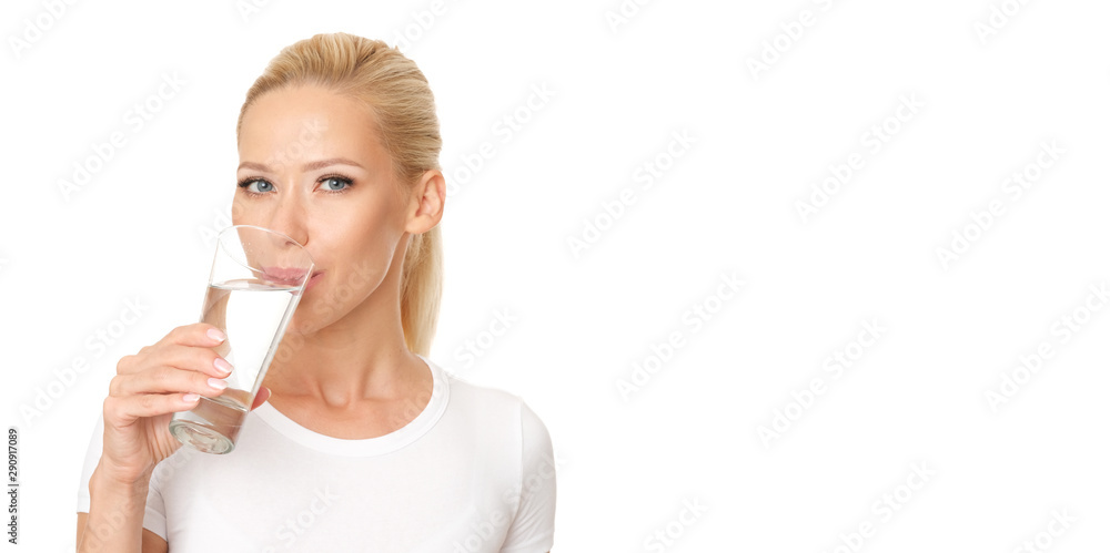Profile picture of healthy and pretty woman drinking a glass of water. Model is isolated on white background. Profile picture of healthy and pretty woman drinking a glass of water. Model is isolated on white background.