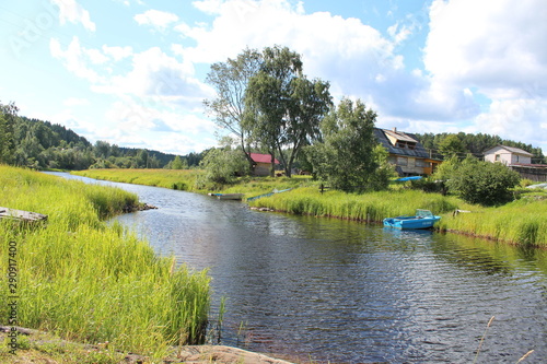 Quiet riverbank scene in rural Russia during the summer