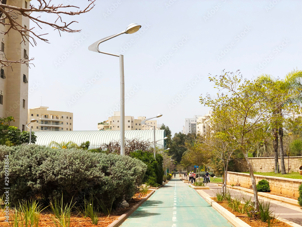 Naklejka premium HOLON, ISRAEL April 07, 2019:Residential building, trees and streets in Holon, Israel