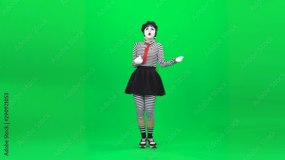 Mime girl playing guitar, begging alms. Chroma key. Full length. Mime girl playing guitar, begging alms. Chroma key. Full length.
