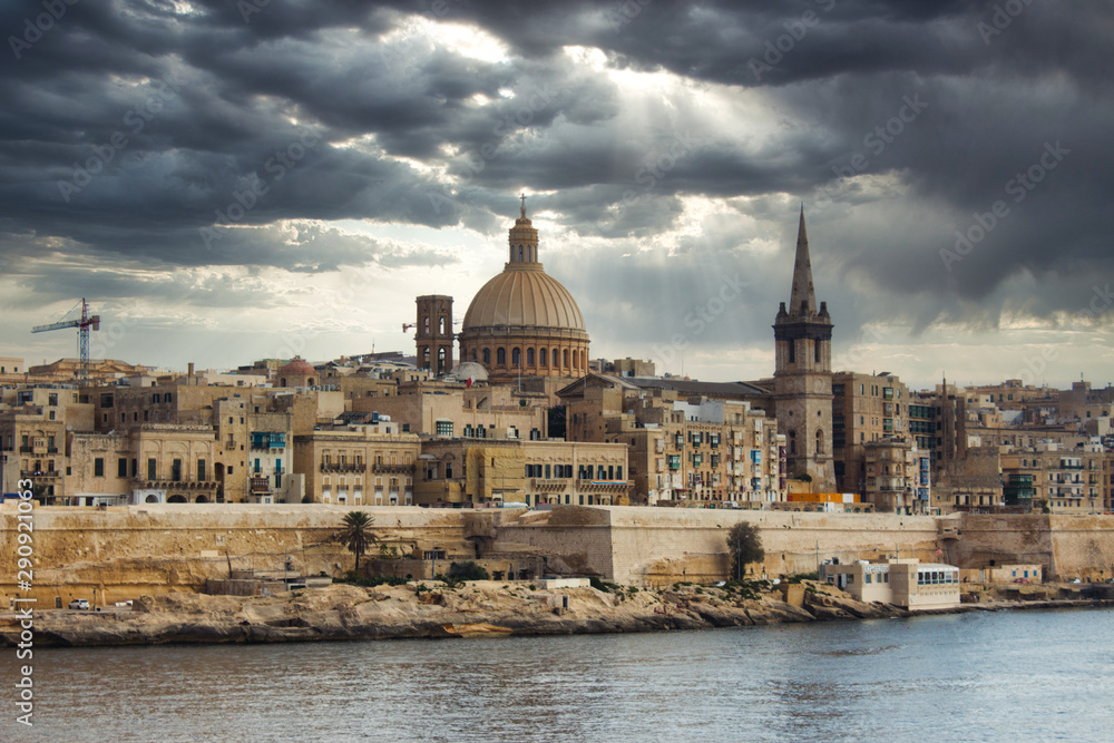 Valletta city skyline with a moody dramatic sky in the background