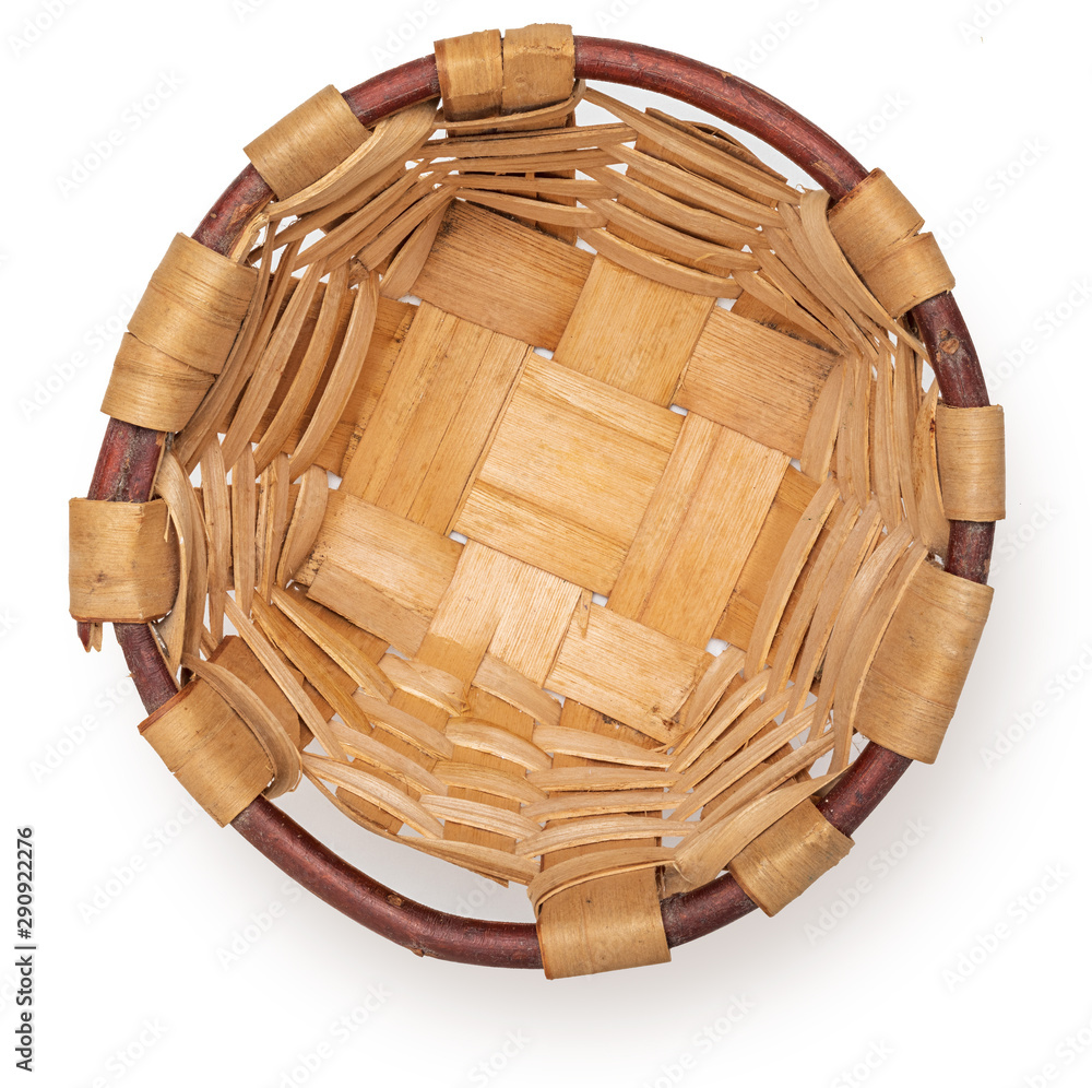 Obraz premium Beautiful wicker basket. Craftsman and handmade at home. Top view. Isolated on white background