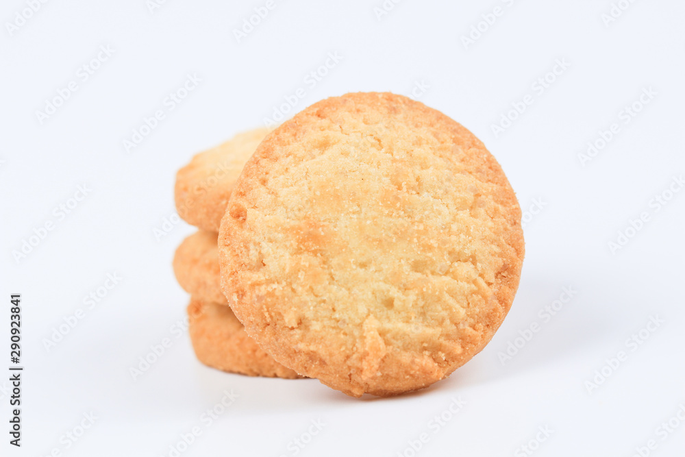 Round sweet cookies. Delicious dessert with high sugar and carbohydrate suitable for eating with milk and tea or coffee on color and white background with colorful placemat Round sweet cookies. Delicious dessert with high sugar and carbohydrate suitable for eating with milk and tea or coffee on color and white background with colorful placemat
