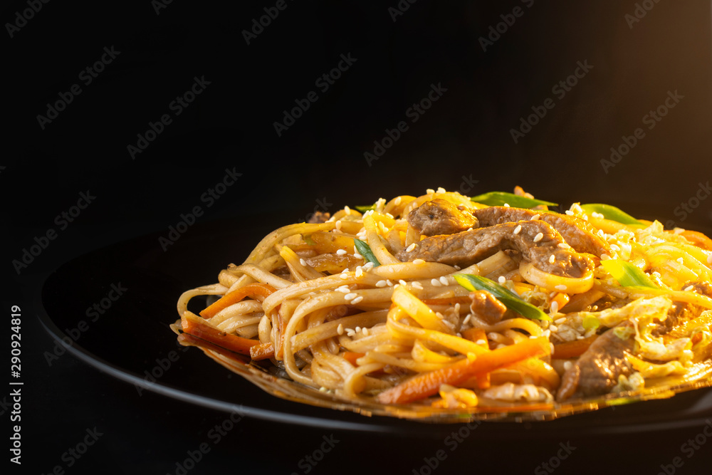 noodles with beef carrots, herbs and sesame seeds, macro noodles with beef carrots, herbs and sesame seeds, macro