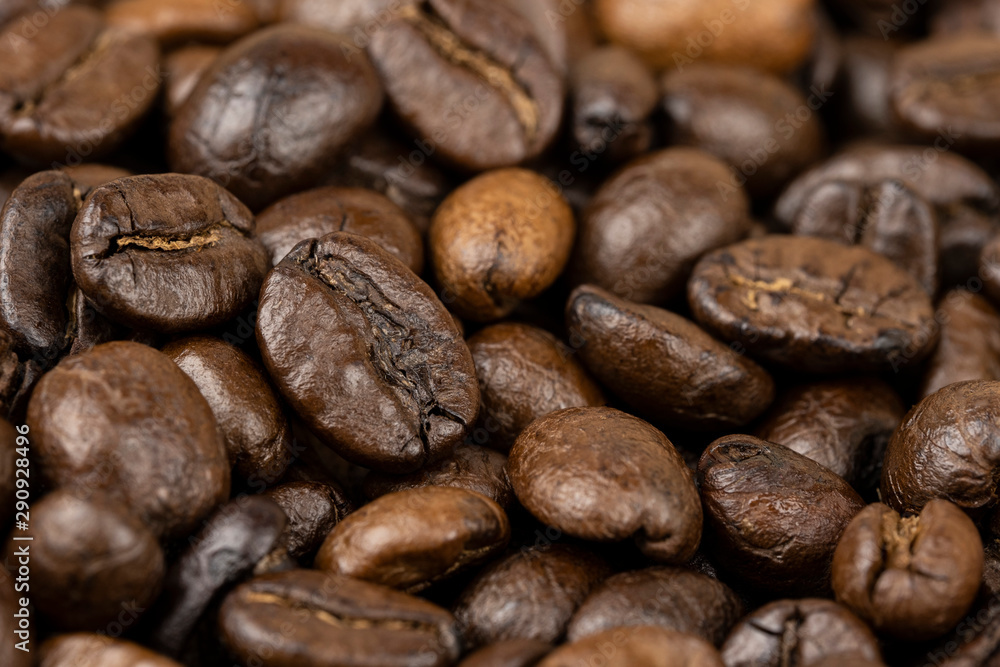 Roasted coffee beans background, Close Up mixture of different kinds of coffee beans. Roasted coffee beans background, Close Up mixture of different kinds of coffee beans.