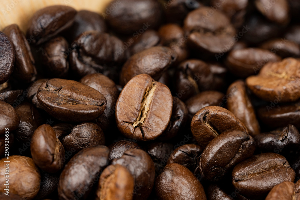 Fototapeta premium Roasted coffee beans background, Close Up mixture of different kinds of coffee beans.