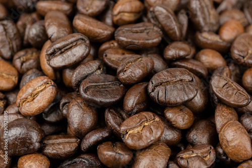 Roasted coffee beans background, Close Up mixture of different kinds of coffee beans.