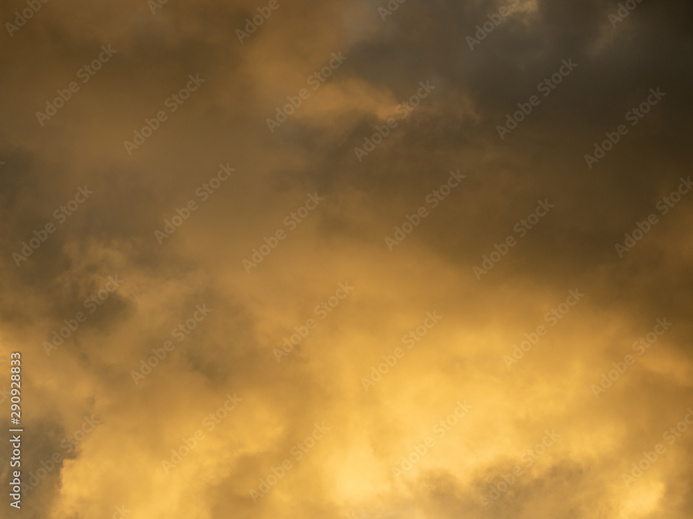 Dramatic yellow sky and dark clouds before a thunderstorm Dramatic yellow sky and dark clouds before a thunderstorm