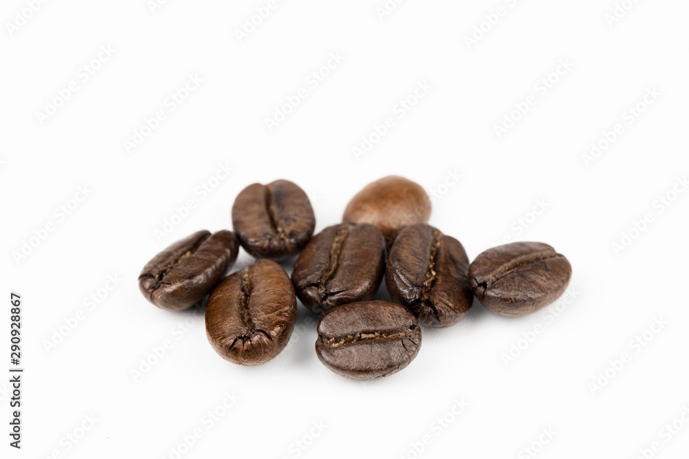 Close up of a coffee bean, Roasted coffee beans isolate on white background Close up of a coffee bean, Roasted coffee beans isolate on white background